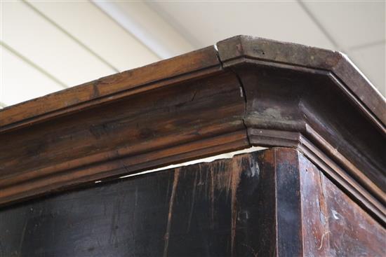 An 18th century French fruitwood armoire W.150cm
